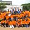 Coe and Bayi (centre) with kids in Dar es Salaam, Tanzania (IAAF)
