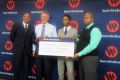 (L-R) Athletics Namibia President, Frank Fredericks, Bank Windhoek's MD Christo de Vries & others during the presentation/ Photo: AN