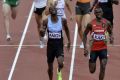 Nijel Amos of Botswana fights it out with Abubaker Kaki of Sudan