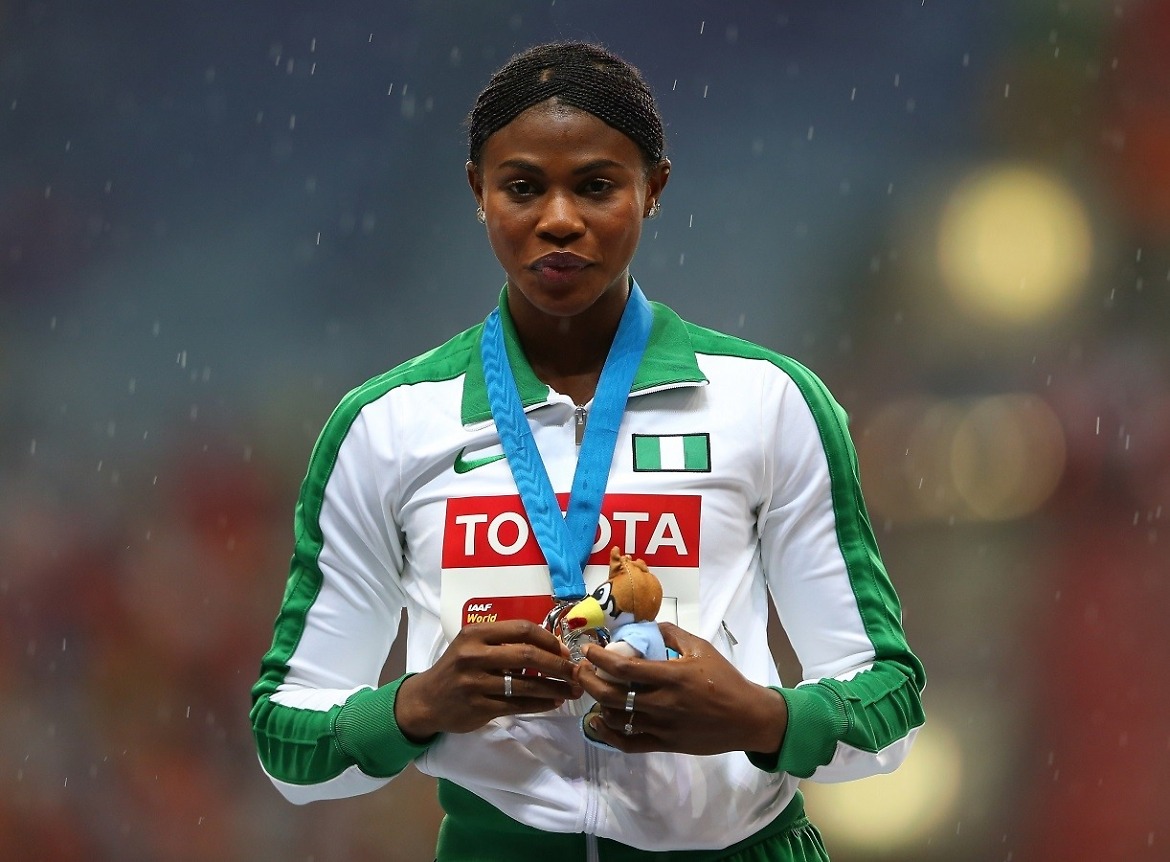 Silver medalist Blessing Okagbare of Nigeria on the podium during the medal ceremony for the Women's Long Jump final during Day Two of the 14th IAAF World Athletics Championships Moscow 2013 at Luzhniki Stadium on August 11, 2013 in Moscow, Russia. (Photo by Mark Kolbe/Getty Images)