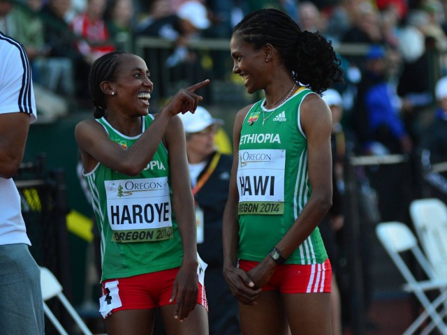 Alemitu Haroye celebrates with Ethiopian teammate Alemitu Hawi after winning the 5000m title with a time of 15:10.08 at the 2014 IAAF World Junior Championships - Oregon 2014 / Photo credit: TrackTown Photo
