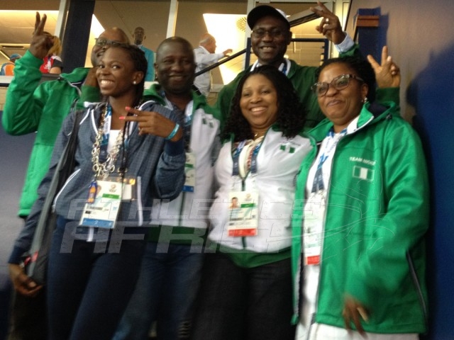 Hon Gbenga Elegbeleye, DG, National Sports Commission; his wife; the Technical Director of AFN, Commodore Omatseye Nesiama; and others celebrates with Ese Brume on her golden feat at the Hampden Park in Glasgow / Photo credit: Yomi Omogbeja