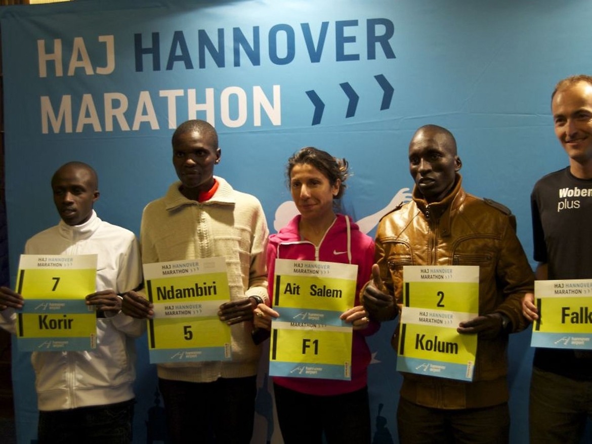 Ronald Korir, Josphat Ndambiri, Souad Ait Salem, Benjamin Kolum and Falk Cierpinski (from left to right) during a press conference in Hannover. Photo Credit: Cecilia Wenig / HAJ Marathon Hannover