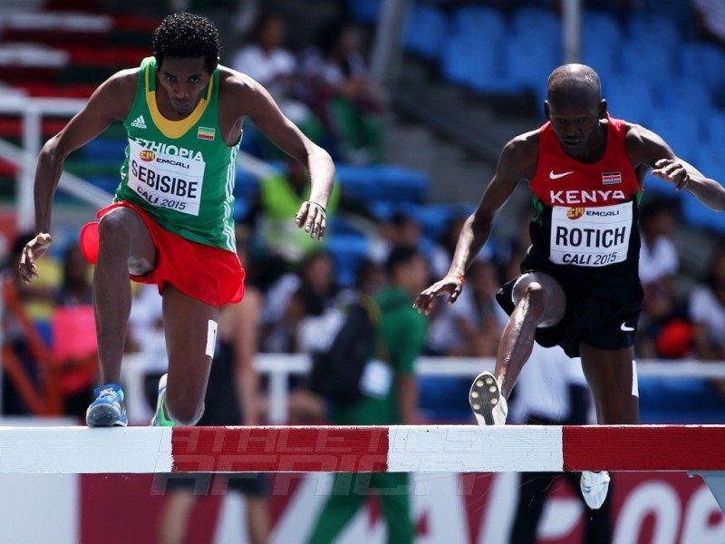 Wogene Sebisibe of Ethiopia and Geofrey Rotich of Kenya in action during round one of the Boys 2000 Meters Steeplechase on day three of the IAAF World Youth   Championships, Cali 2015 on July 17, 2015 at the Pascual Guerrero Olympic Stadium in Cali, Colombia. (Photo by Patrick Smith/Getty Images for IAAF)