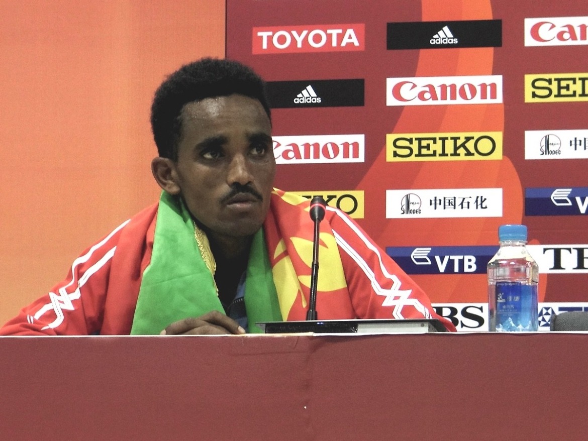 Eritrean Ghirmay Ghebreslassie at the Press Conference after winning the men's marathon gold medal on Day 1 of Beijing 2015 / Photo credit: Yomi Omogbeja