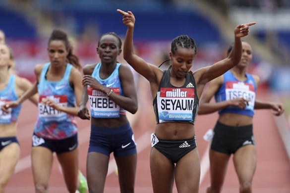 Ethiopa's Dawit Seyaum celebrates winning the Women's 1500m during the Muller Grand Prix at the Alexandra Stadium, Birmingham