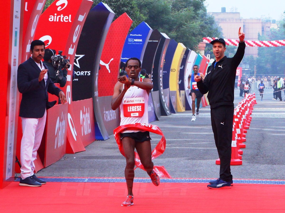 Ethiopian Berhanu Legese winning the Airtel Delhi Half Marathon 2017, an IAAF Gold Label Road Race / Photo Credit: Procam International