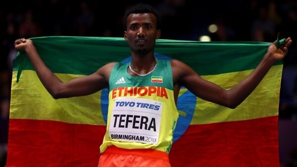 Gold Medallist, Samuel Tefera of Ethopia celebrates winning the Mens 1500 Metres Final during the IAAF World Indoor Championships on Day Four at Arena Birmingham on March 4, 2018 in Birmingham, England. (Photo by Michael Steele/Getty Images for IAAF)