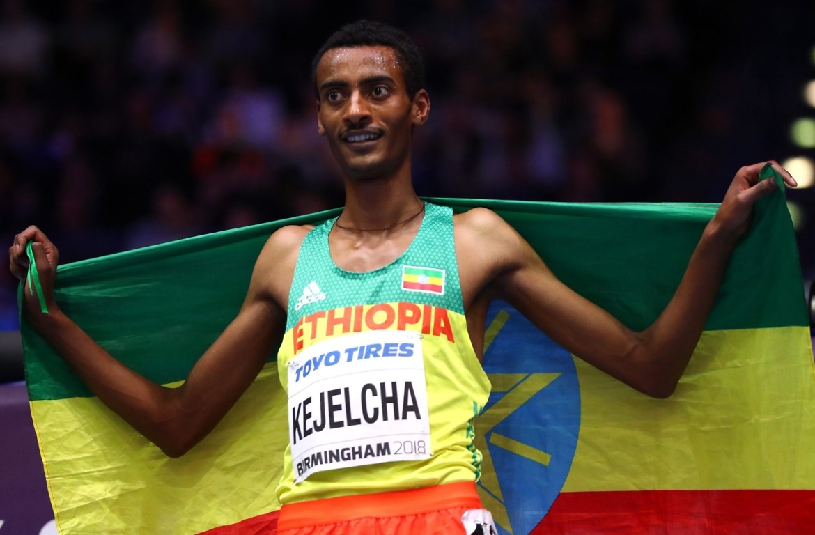 Gold Medallist, Yomif Kejelcha of Ethopia celebrates after the Mens 3000 Metres Final during the IAAF World Indoor Championships on Day Four at Arena Birmingham on March 4, 2018 in Birmingham, England. (Photo by Michael Steele/Getty Images for IAAF)