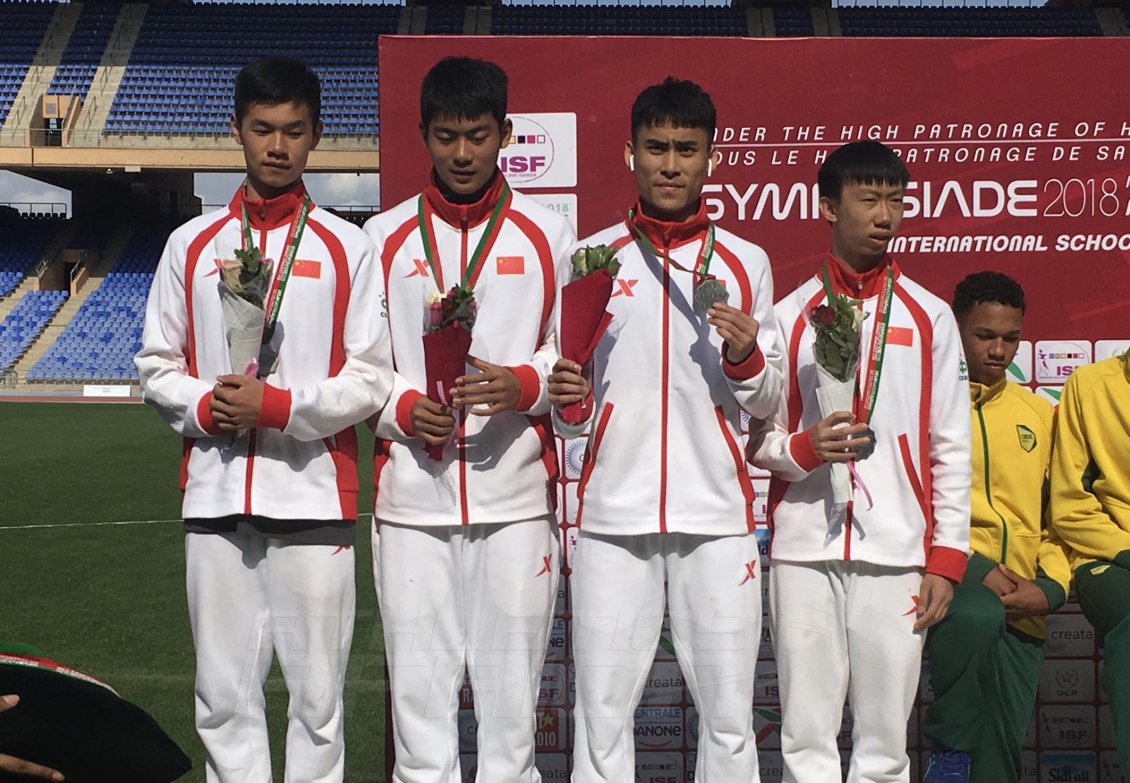 The Chinese quartet after the Boys 4x100m relays medal presentation at Gymnasiade 2018 in Marrakech / Photo Credit: Yomi Omogbeja