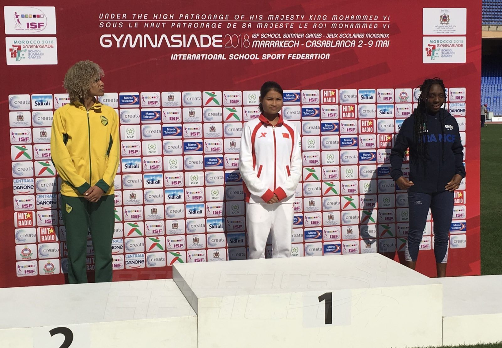 Medal presentation for the Girls 400m hurdles at the Gymnasiade 2018 / Photo Credit: Yomi Omogbeja