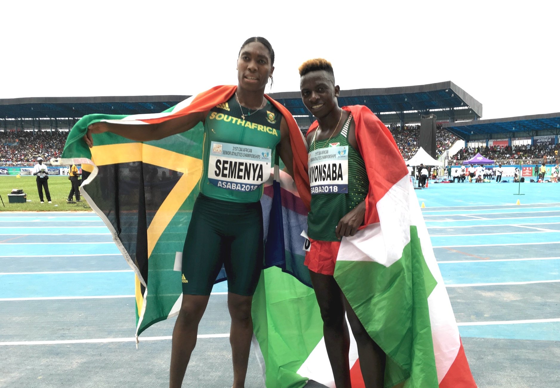 South Africa's Caster Semenya and Francine Burundi after the taking gold and silver in women's 800m at the 2018 African Senior Championships in Asaba / Photo credit: Yomi Omogbeja