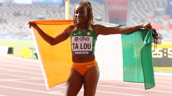 Marie-Josée Ta Lou of the Ivory Coast, bronze, celebrates after the Women's 100 Metres final during day three of 17th IAAF World Athletics Championships Doha 2019 at Khalifa International Stadium on September 29, 2019 in Doha, Qatar. (Photo by Alexander Hassenstein/Getty Images for IAAF )