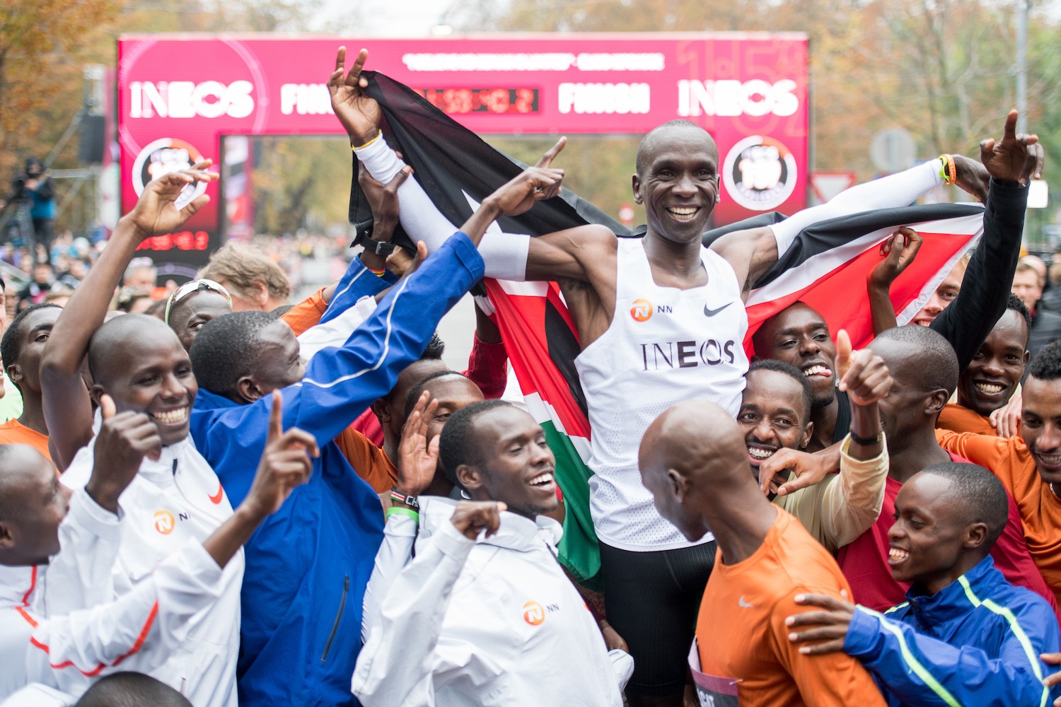Eliud Kipchoge celebrating with his pacemakers, in Vienna at the finish line. Credit: Vienna City Marathon / Michael Gruber