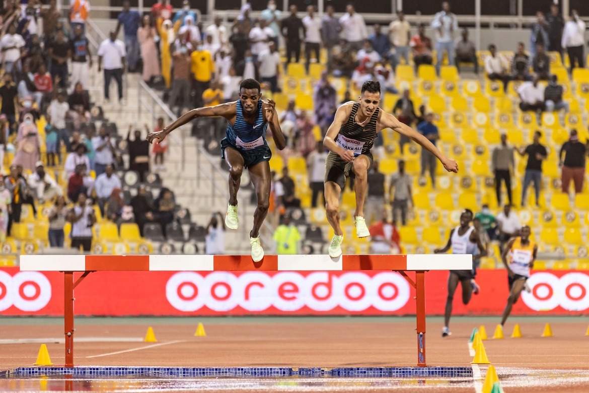 Morocco's Soufiane El Bakkali and Ethiopia's Lamecha Girma in Doha