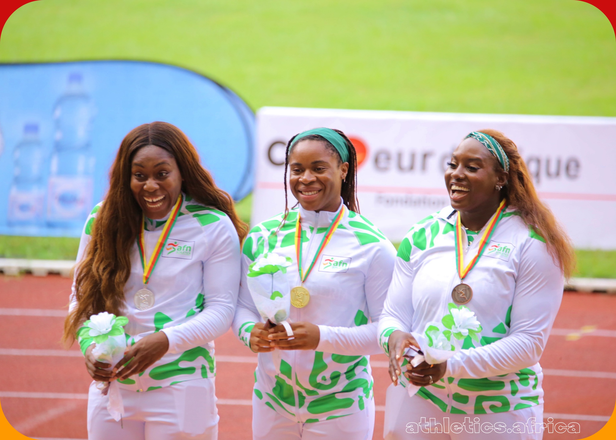 Nigerian women, Ashley Anumba (centre), Obiageri Amaechi and Chioma Onyekwere receiving the women’s discus throw medals at the 23rd CAA African Athletics Championships Douala 24 / Photo: Neto Oluwasegun