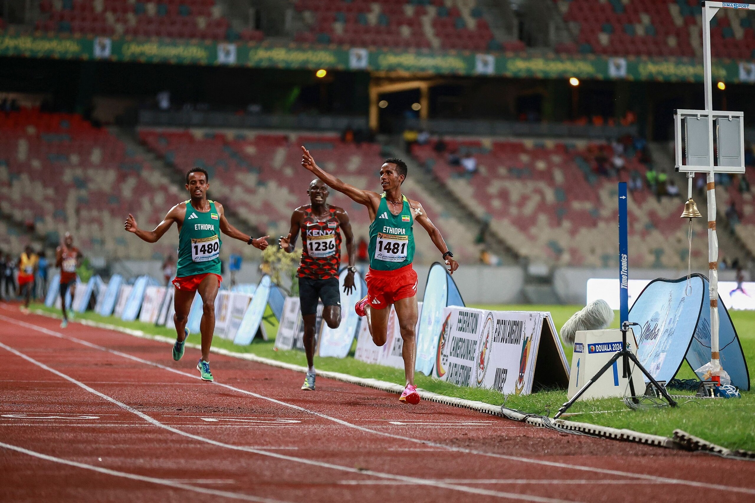 Nibret Melak celebrates his 10,000m win at the African Championships in Douala (© AFP / Getty Images