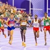 Uganda’s Joshua Cheptegei wins the Paris 2024 men's 10,000m at the Stade de France / Photo: Kelly Ayodi for NOCK