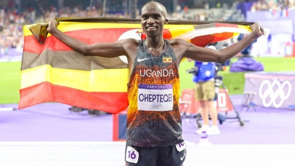 Uganda’s Joshua Cheptegei wins the Paris 2024 men's 10,000m at the Stade de France / Photo: Kelly Ayodi for NOCK