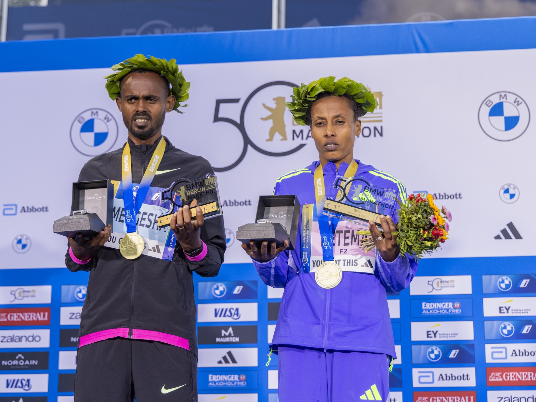 BMW Berlin Marathon winners, Milkesa Mengesha and Tigist Ketema from Ethiopia / Photo credit: SCC EVENTS / Jean Marc Wiesner