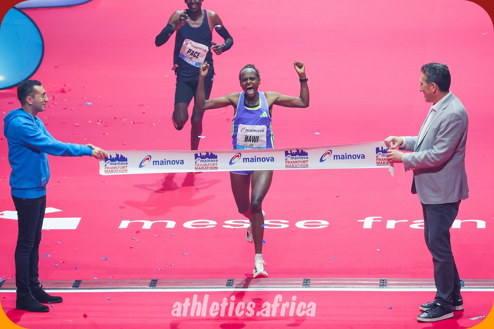 Hawi Feysa celebrates at the finish of 41st Mainova Frankfurt Marathon 2024 | Photo credit: Sailer / photorun.net