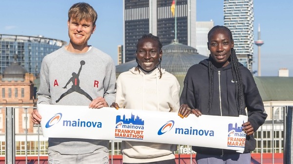 The Masai Family: Jake Robertson, Magdalyne Masai and Linet Masai (right) in Frankfurt - October 2024 | Photo credit: Norbert Wilhelmi / Mainova Frankfurt Marathon