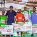 Harrison Muchira Wanjiru and other winners with NSC chairman Shehu Dikko at the 2025 ECOWAS Abuja International Half-marathon / Photo: Organisers