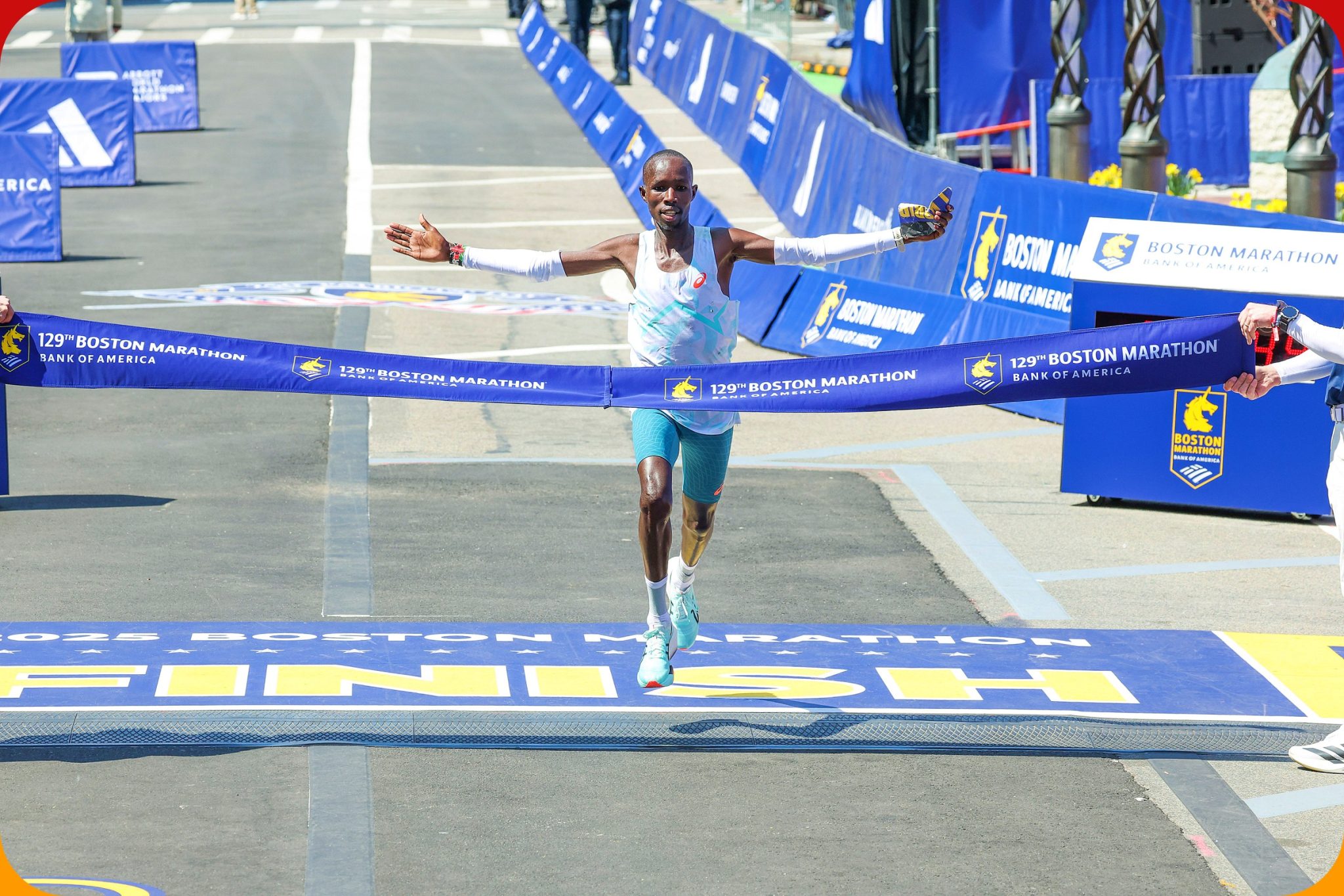 Kenyan John Korir celebrates winning the men's title at the 129 Boston Marathon on Monday 21 April, 2025 / Photo credit: Victah Sailer / BAA