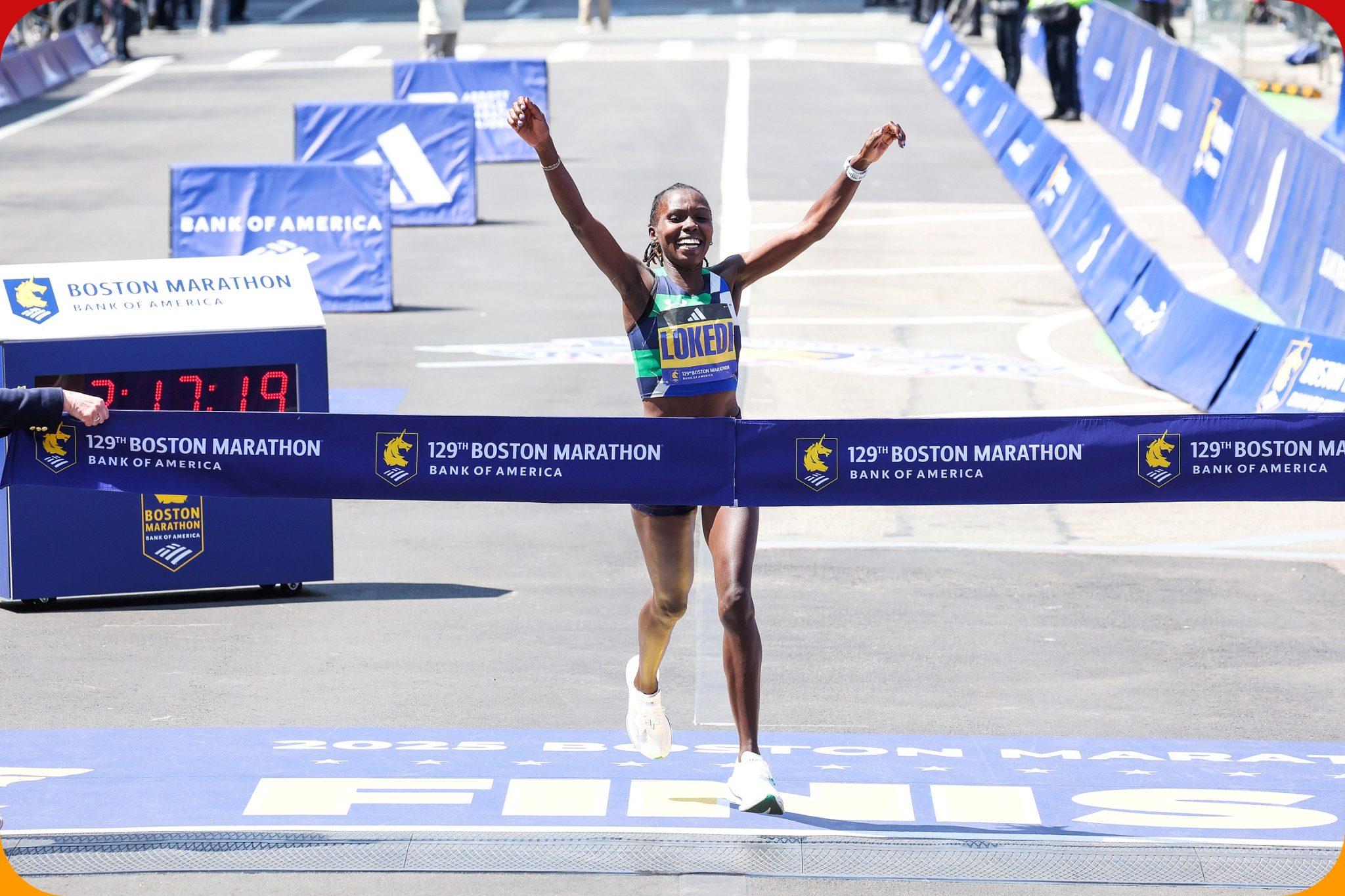 Kenyan Sharon Lokedi celebrates winning the women's title at the 129 Boston Marathon on Monday 21 April, 2025 / Photo credit: Victah Sailer / BAA