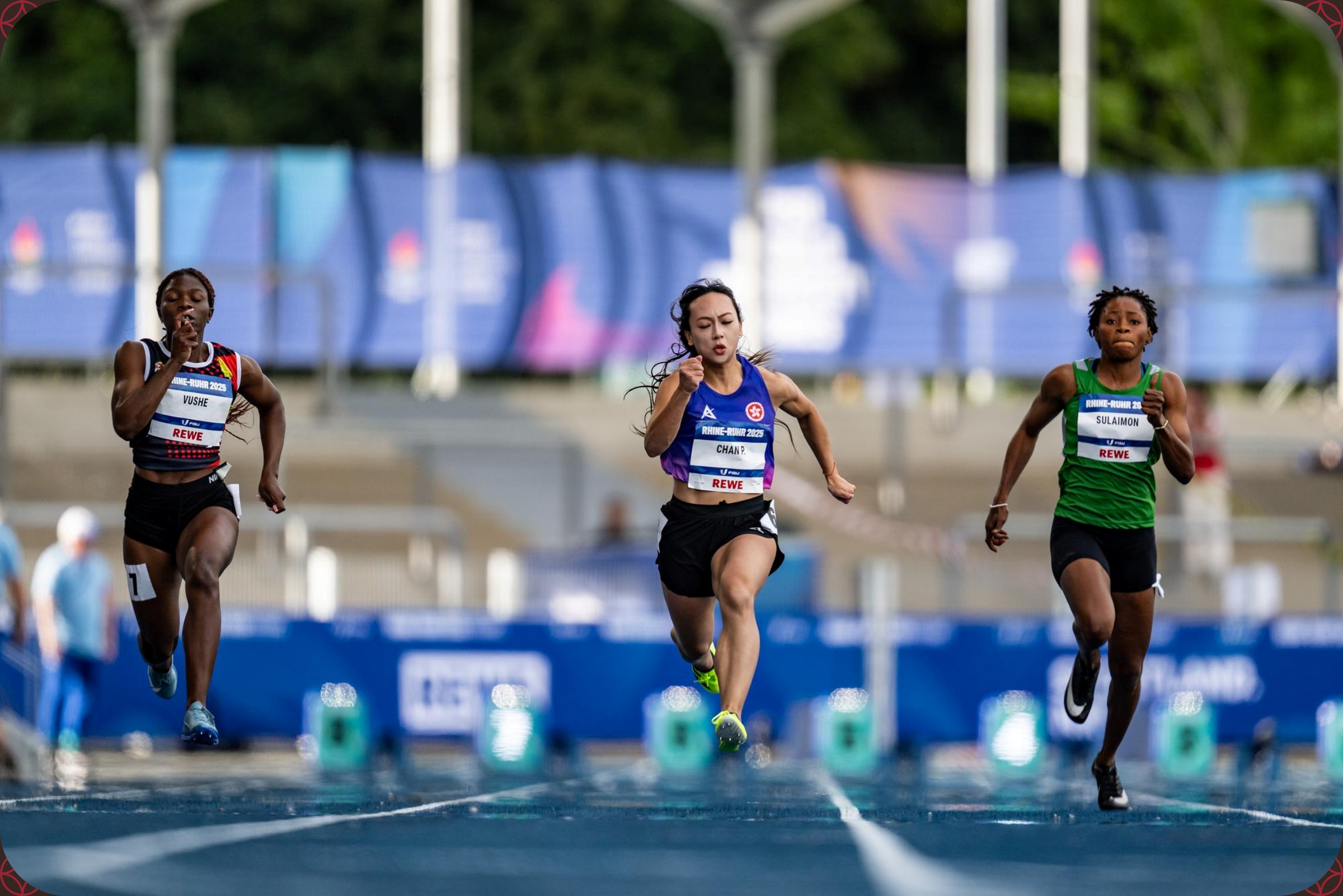Taofikat Morenikeji Sulaimon of Nigeria and Rutendo Vushe of Zimbabwe competing in the Women's 100m Round 1 at the Rhine-Ruhr 2025 FISU Games in Bochum on Monday 21/07/2025 | Photo credit: Kevin Voigt / Rhine-Ruhr 2025