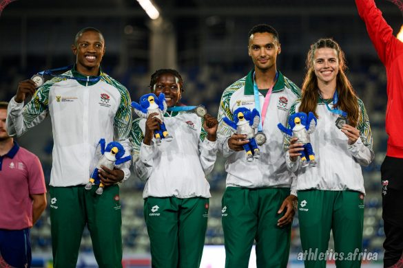 Team South Africa - Mthi Mthimkulu, Precious Molepo, Lythe Pillay, and Marlie Viljoen - celebrates their Silver on the podium during medal ceremony of the Mixed 4x400m Relay Final at the Rhine-Ruhr 2025 FISU Games in Bochum on Thursday 24/07/2025 | Photo credit: Lukas Schulze / Rhine-Ruhr 2025